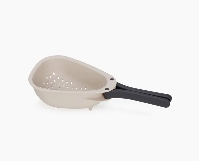 joseph-joseph-droplet-mini-white-colander-with-folding-handle-space-saving-strai image 1