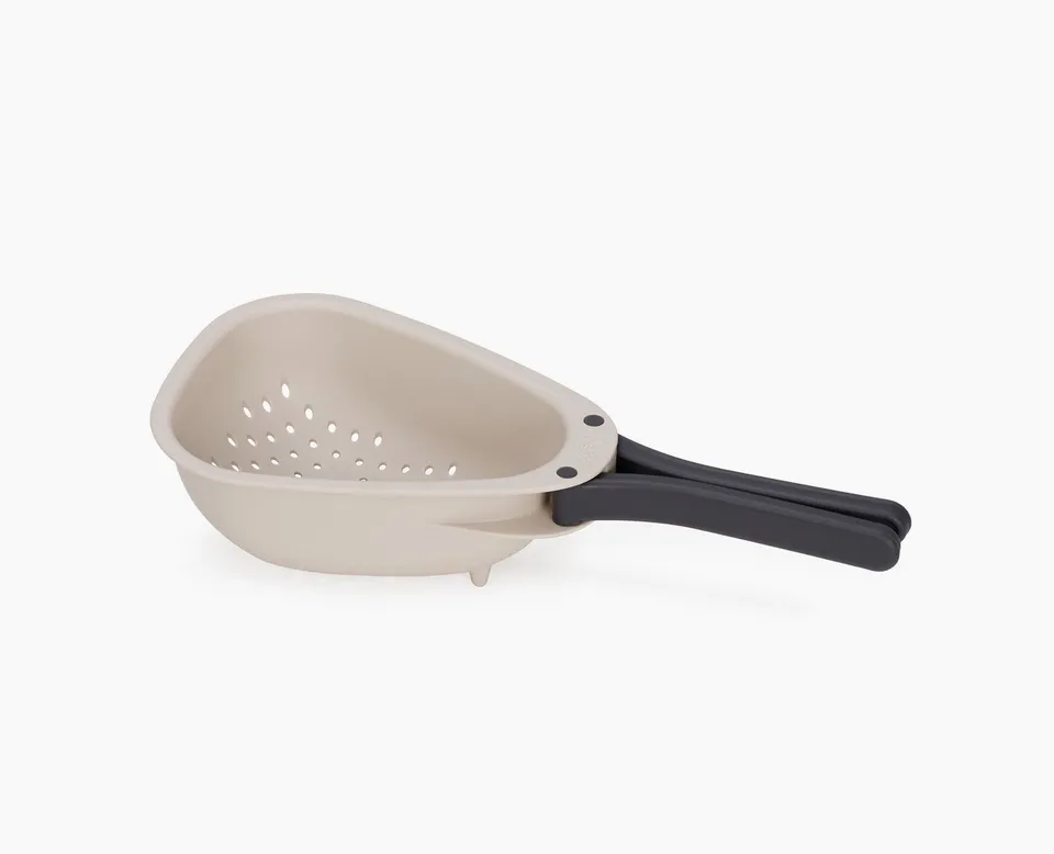 joseph-joseph-droplet-mini-white-colander-with-folding-handle-space-saving-strai image 1