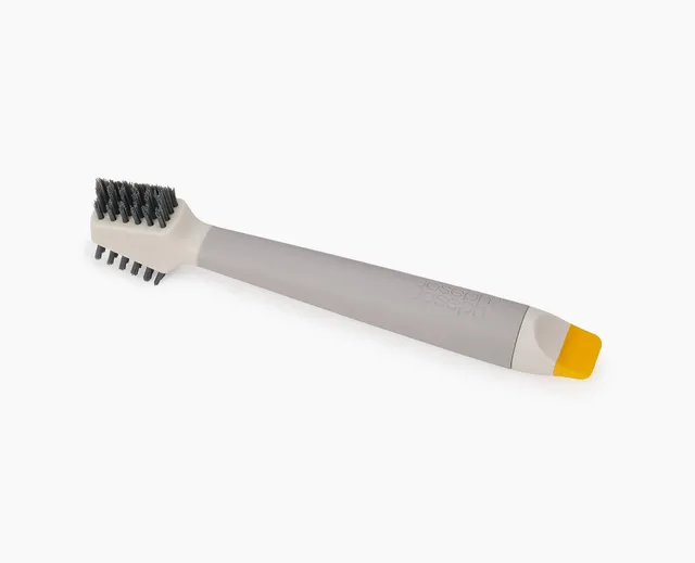 joseph-joseph-cleantech-3-in-1-spot-cleaning-tool-flat-v-shaped-bristles-scraper image 1