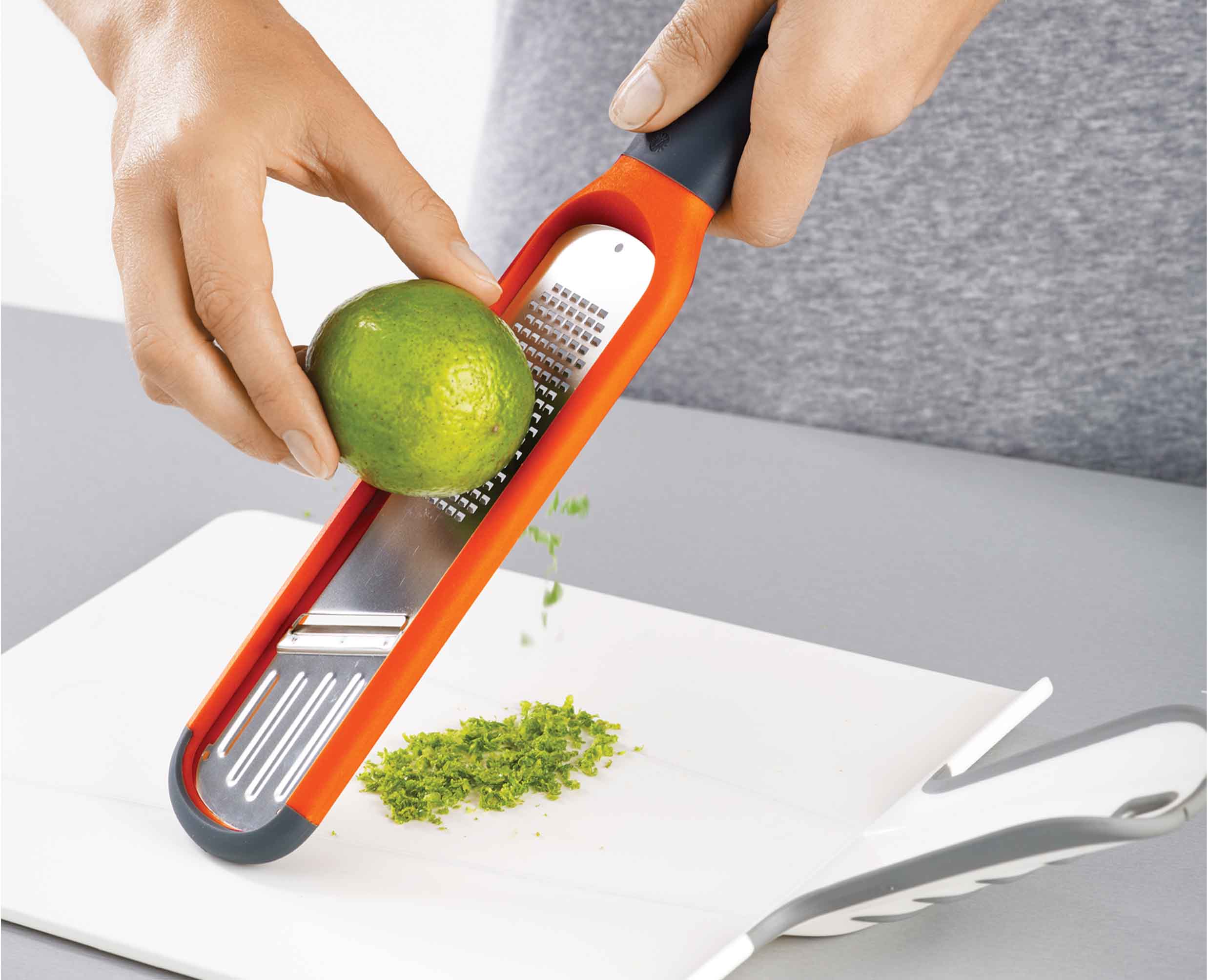 joseph-joseph-handi-grate-2-in-1-mini-grater-slicer-orange image 6