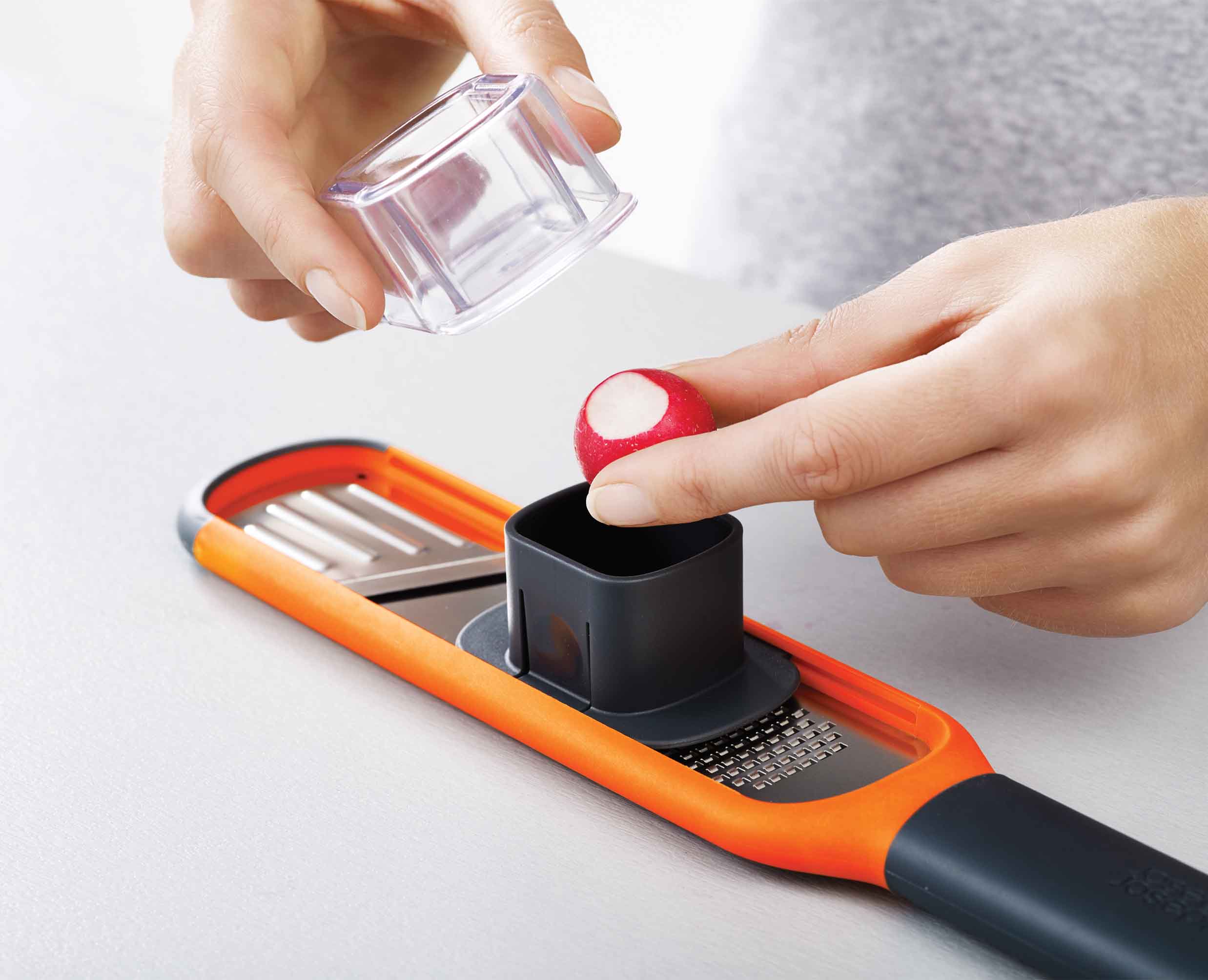 joseph-joseph-handi-grate-2-in-1-mini-grater-slicer-orange image 7