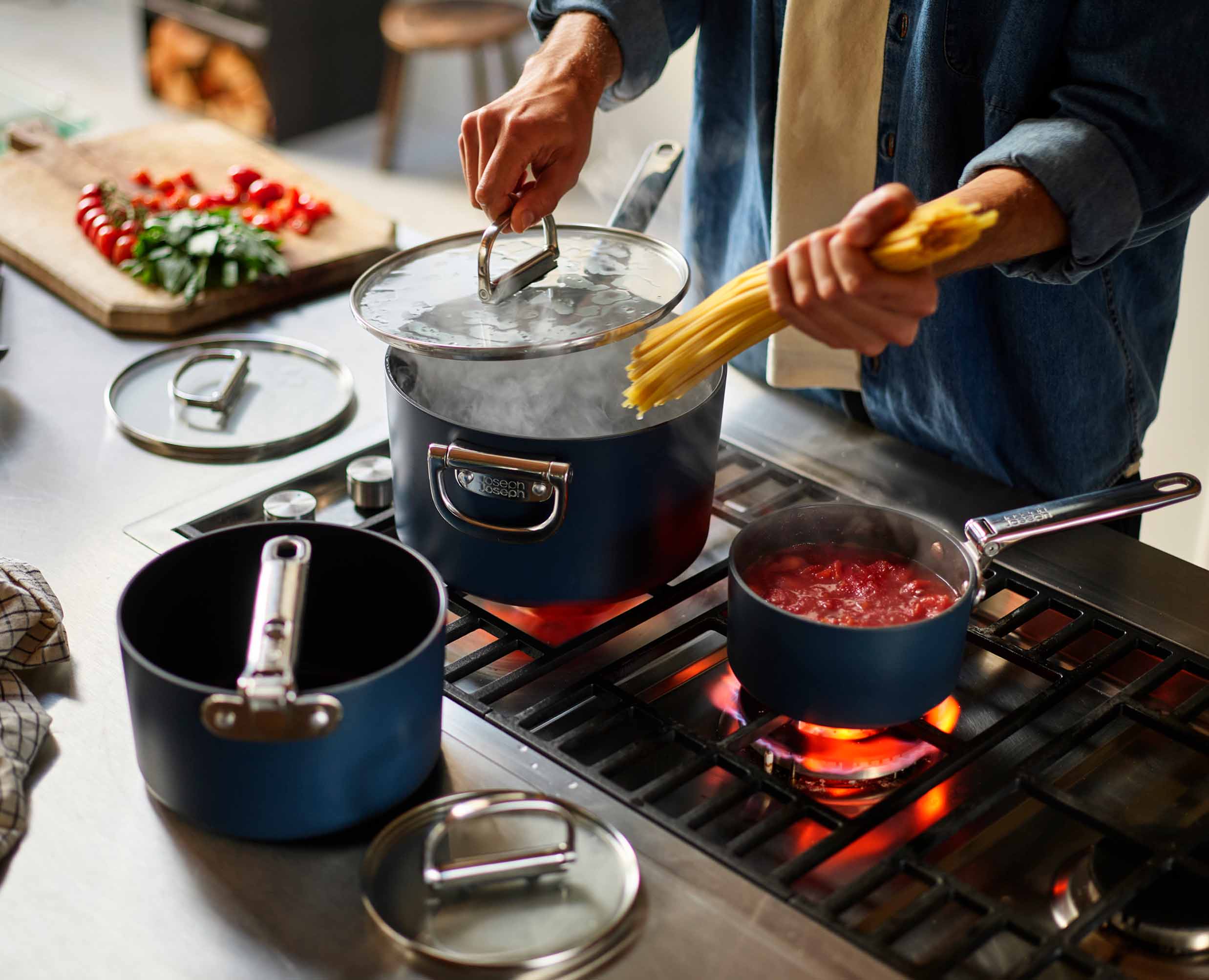 joseph-joseph-space-folding-handle-ceramic-non-stick-3-piece-blue-saucepan-set image 3