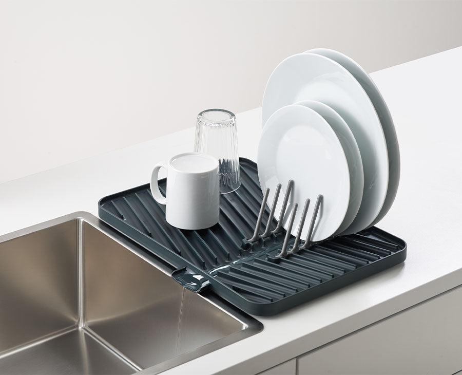 joseph-joseph-flip-up-grey-draining-board-space-saving-foldable-dish-drainer image 2